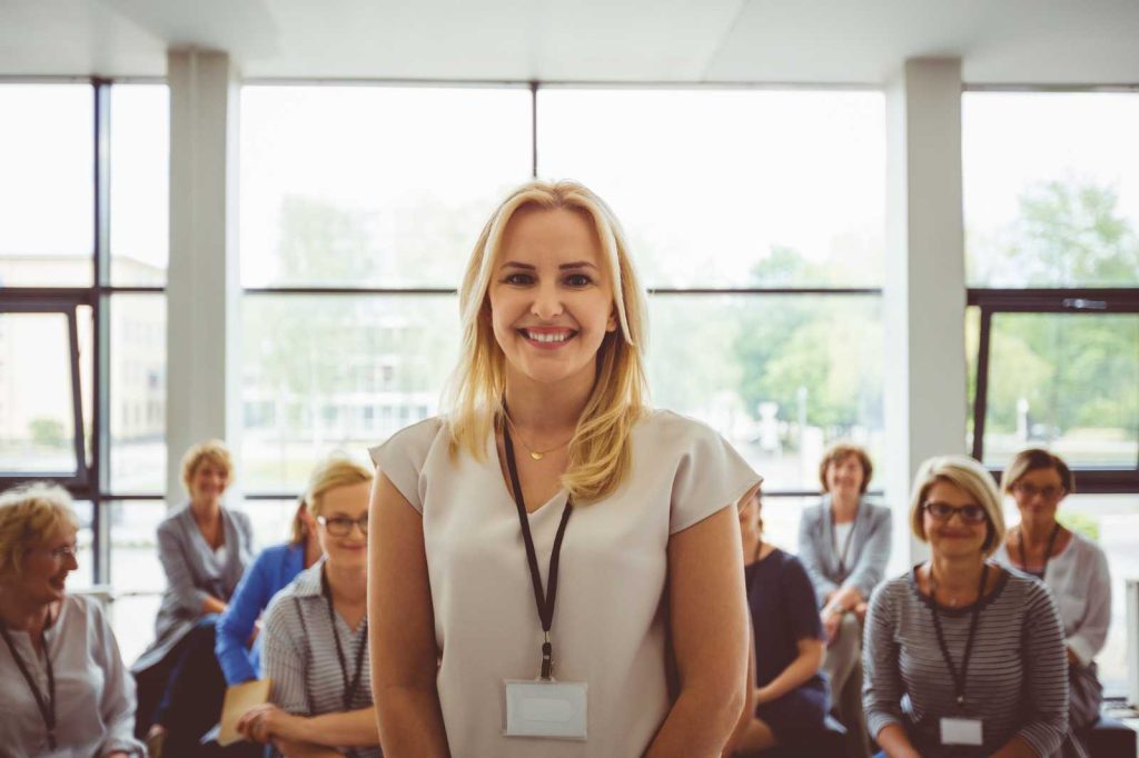 Smiling businesswoman representing Global Business Support.